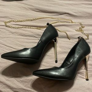 Black and gold heels